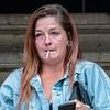 Plane passenger, 38, who drank duty-free booze before being aggressive onboard told police she had 'missed her flight' when she was arrested