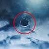 Flying saucer UFO is caught on camera by US MILITARY in newly-released footage