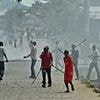 Six people accused of witchcraft are killed by mob who burn two alive, stone others to death or fatally beat them with clubs
