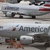 American Airlines flight is evacuated on runway as landing gear falters