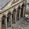 Heavens above! Pedestrian has incredibly lucky escape after Victorian church collapses into the street just as she walked past