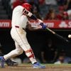 Kyle Hendricks throws 7 shutout innings and Angels score 12 two-out runs in 12-2 win over Twins