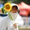Chinese students sleep off heatwave in libraries and tents