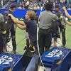 Shocking moment brazen US Open fan tries to STEAL from Jannik Sinner's bag while it's on his back