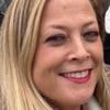 Woman stabbed to death before gas explosion named