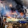 Grote brand op industrieterrein Veenendaal, rookwolken in wijde omgeving te zien