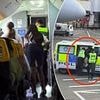 Moment a passenger was hauled off Ryanair flight by police for 'vaping in toilets' after two-hour flight delay