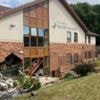 Two arrested as car crashes into care home