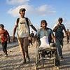 Trump's top advisers head into Gaza to survey humanitarian crisis as president softens his stance