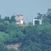 Powerful sister of North Korean leader denies removal of front-line speakers