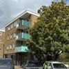 Manhunt after woman dies following flat fall