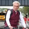 Pioneering pop legend, 73, takes a Road To Nowhere as he rides his mountain bike through New York City - can YOU guess who he is?