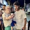 Carlos Alcaraz gets a pizza the action with fans as defending Wimbledon champion dines out in London ahead of men's final clash at SW19
