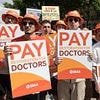 Doctors threaten fresh strike action over 'woeful' 4% pay boost - while teachers and nurses also put Labour on notice of 'summer of discontent'
