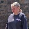 'XL Bully' owner whose dog bit a nine-year-old girl's face walks free from court - and hound returns home