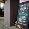 US filings for jobless aid, a proxy for layoffs, inch down modestly last week