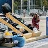 Soap, wristbands and scaling the UN: People get creative during final plastic pollution treaty talks