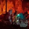 Ukraine and Russia strikes hit homes and oil depot near Black Sea