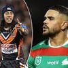 Police allegedly punched in the head as two men are accused over wild footy brawl that saw two fans rushed to hospital