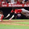 Lux hits 2-run homer and Singer pitches triple-happy Reds to 4-1 win over Angels