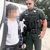 Mom of boy, 11, handcuffed and perp walked by cops in effort to 'ridicule' him says he now can't sleep or go out in public