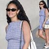 Vick Hope continues to spark pregnancy rumours as she steps out in a stomach-hugging dress after fans congratulated her on 'baby news'