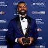 Mohamed Salah and Alessia Russo dress to impress as they collect FWA Footballer of the Year awards at ceremony in London