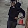 Murder suspect filmed with gun in street chase