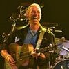 New video shows Chris Martin cringe at sight of embarrassed CEO caught cuddling HR boss during Coldplay concert