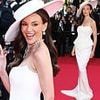 Michelle Keegan puts on a glamorous display in a structured white gown and dramatic hat while in Cannes ahead of L'Oreal Light on Women Award