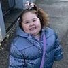 Woman, 50, is charged after cockapoo dog mauled three-year-old girl in attack that forced father to 'hold her skin together'