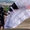 Felix Baumgartner's heartbroken widow shares footage of him taking off on doomed paraglider flight - as she reveals how she held daredevil's hand as he lost battle for life