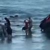 Dozens of migrants land on Algarve beach loved by Brits... and are immediately taken before judge and ordered to leave the country, in stark contrast to soft-touch UK