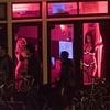 Amsterdam's plan to get rid of its red light district - by creating a five-storey mega-brothel 'erotic prison' filled with prostitutes and dumping it on another suburb