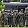 Frantic hunt for gunman after Democratic lawmakers shot at their homes in 'targeted attacks'