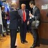 Moment Putin's legs 'twitch suspiciously' in Trump farewell as Russian dictator dons platforms to overcome 'Napoleon complex' - amid rumours he wore EXOSKELETON