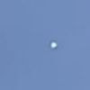 Eerie UFO footage from family barbecue shows white orb hovering in the sky for 25 MINUTES in broad daylight