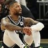 Milwaukee Bucks cut Damian Lillard two months after Achilles tear to sign free agent Myles Turner