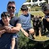 Simon Cowell gives a rare insight into his family album as he shares pitures of his lookalike son Eric, 11, during sun-soaked dog walk