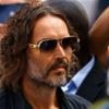 Russell Brand arrives at court for first hearing