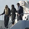 Powerful moment Charlie Kirk's widow Erika holds hands with Usha Vance on his final journey on Air Force Two
