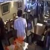 Suspected arson attack at restaurant was like a 'Hallowe'en scene', shocked witnesses say - as CCTV shows man on fire and three people are left in 'life-threatening condition'
