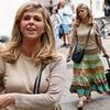Kate Garraway puts on a brave face as she steps out in a quirky outfit after being forced to sell £2million second home to pay off debt from caring for late husband Derek Draper