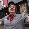 Mourners line streets for funeral of world's longest KFC worker as hearse makes final visit to restaurant where she fried chicken for 47 years