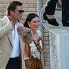 Nice heels, Tom Brady! NFL star swaps sneakers for fancy velvet slippers trimmed with plush bow at Bezos wedding party