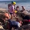 Terrifying moment two children become trapped in sinking sand hole on California beach