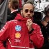 Lewis Hamilton gives 'cold stare' to British celebrity after 'body check' on Silverstone grid during very awkward run-in