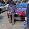 Moment furious woman walks into middle of the road in Mayfair to confront Aston Martin driver for revving too loudly