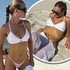 Rosie Huntington-Whiteley shows off her incredible figure in a white bikini top and TINY thong on the beach