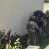 Major terror attack 'was just HOURS away' before it was foiled by the special forces and police: Seven Iranians arrested in raids after 'biggest counter-state threat in years'